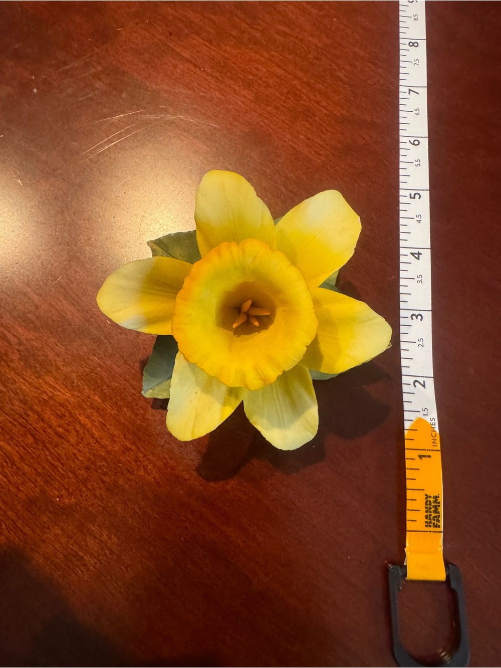 Porcelain flower figurine titled 'Yellow Rose' by Napoleon Capodimonte